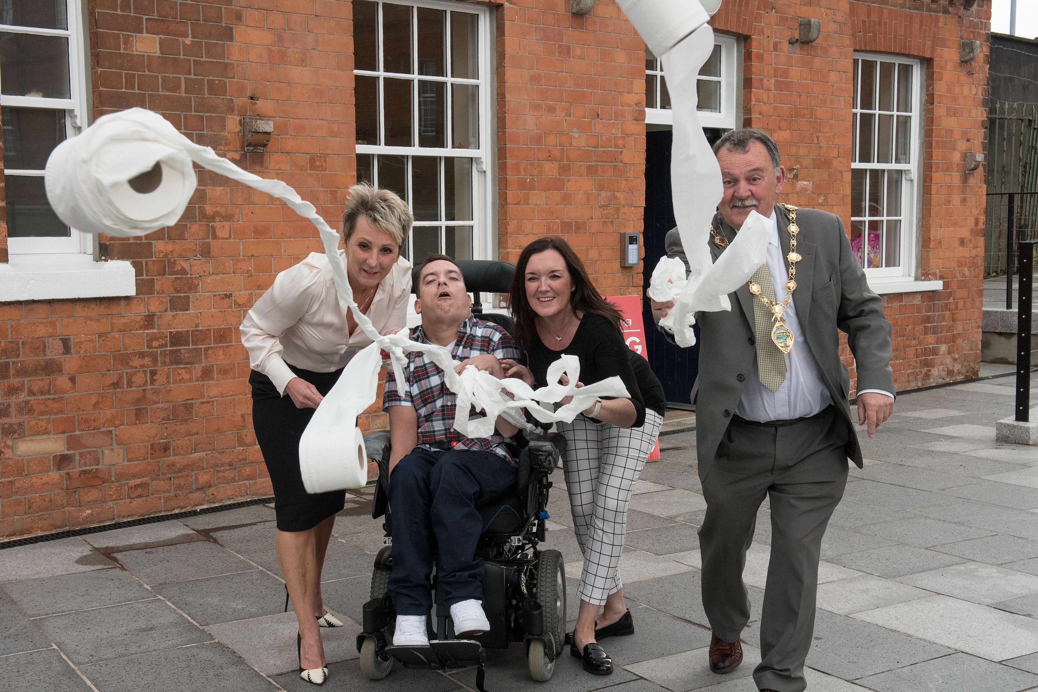 Linda Beckett, General Manager of Glen Caring, Jonathan Hagon, service user, Orla McCann, Disability Action NI and the Mayor of Derry City and Strabane District Council, Councillor Maolíosa McHugh celebrate the opening of the new Glen Caring State-of-the-Art ‘Changing Places’ facility in Ebrington Square, Derry/Londonderry. 